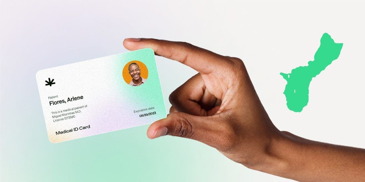 closeup hand holding MMJ card